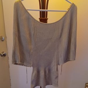 Ladies sweater with gold lame threads and angel sleeves.